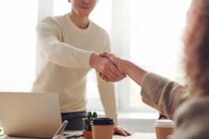 Two people shaking hands: how to find a successor